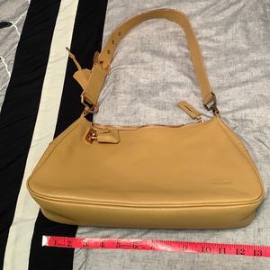 Prada purse. Tan. Length 13”, width 3-1/2”, height 7”, and strap 10”